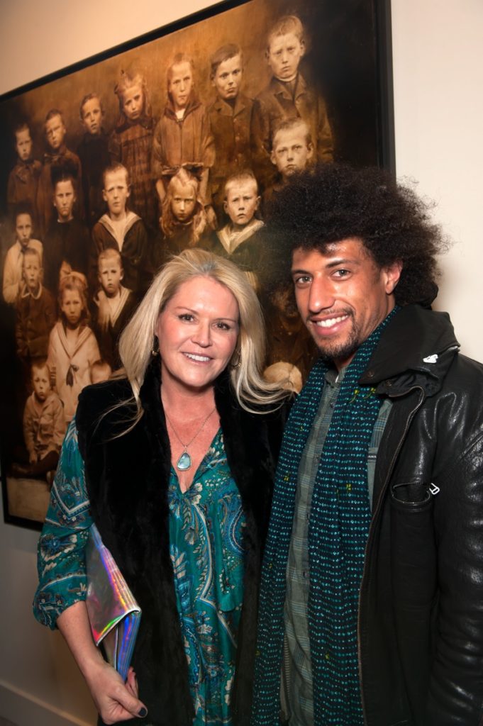 Jennifer McSweeney and Tripoli Patterson with Andrei Zadorine’s painting “Class Reunion II”