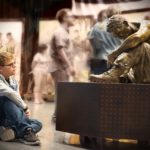 The Eyes of Freedom: A Traveling Memorial Young person looking at the Silent Battle statue