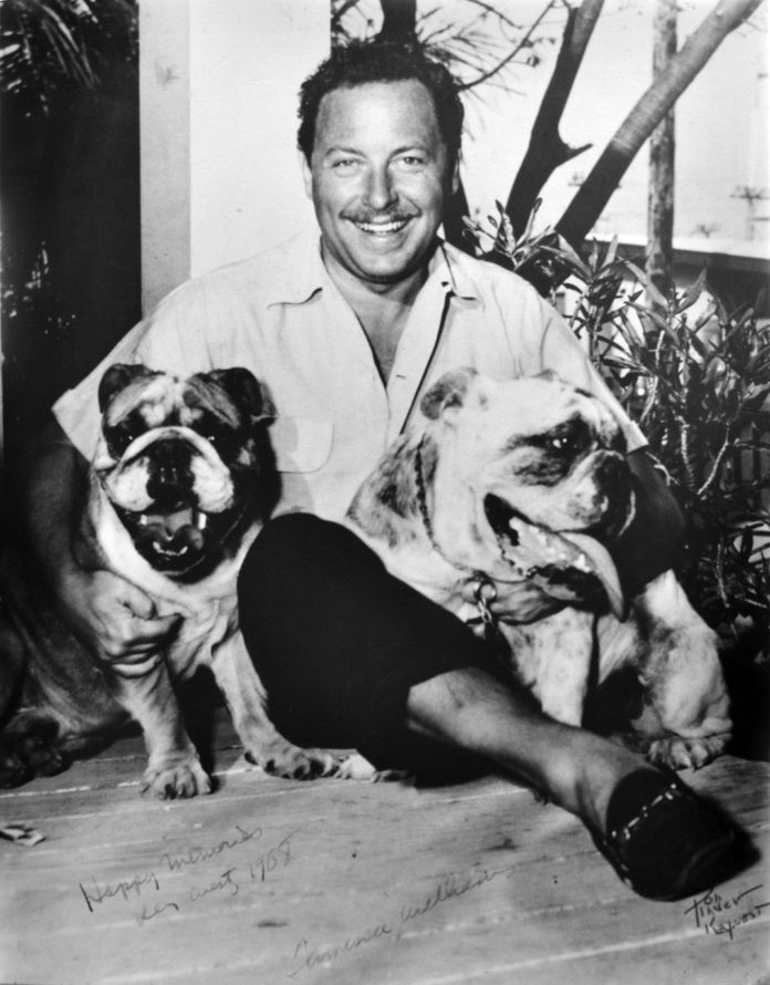 Tennessee Williams with his bulldogs