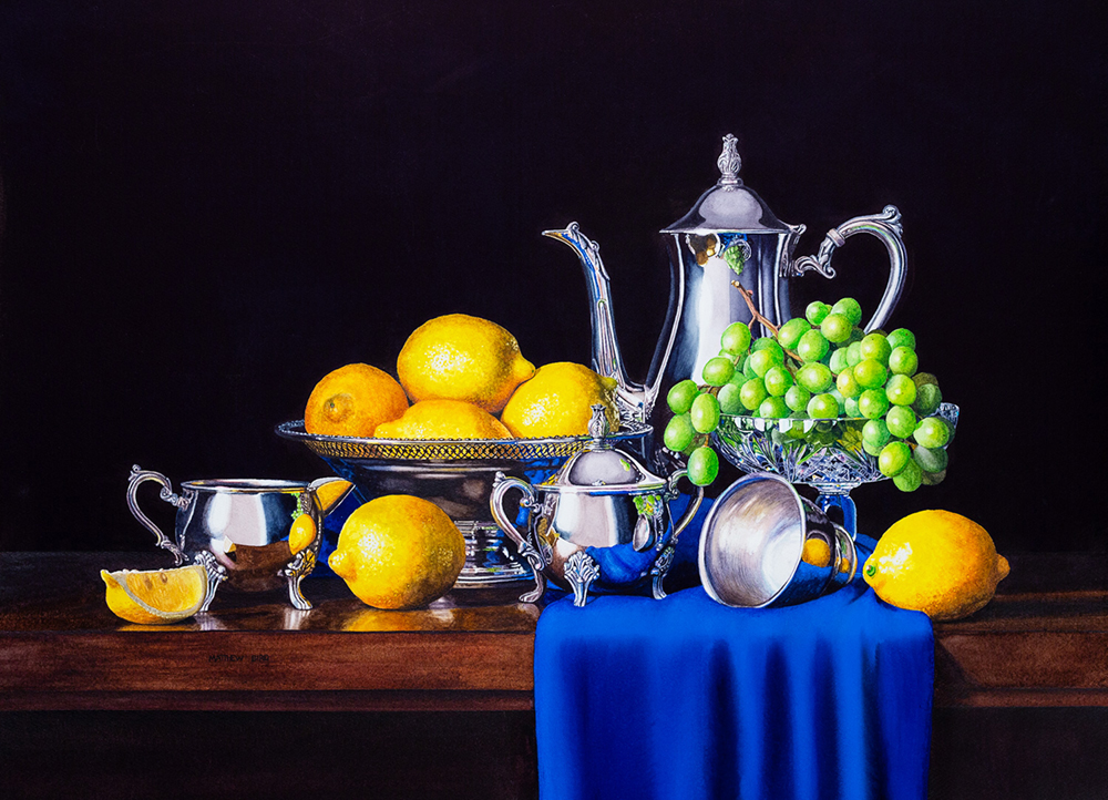 Watercolor still life painting with lemons, silver service, and grapes on a table with a blue cloth
