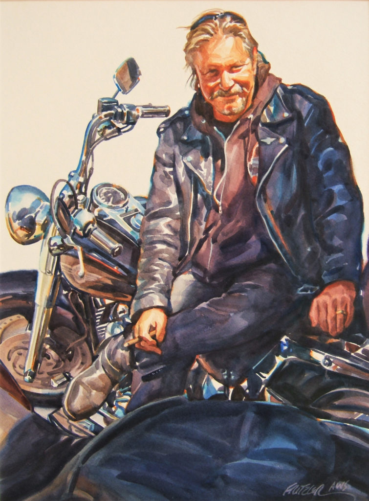 Watercolor painting of a man on a motorcycle