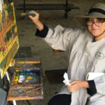 Artist Spotlight: Jill Banks Woman artist painting on an easel