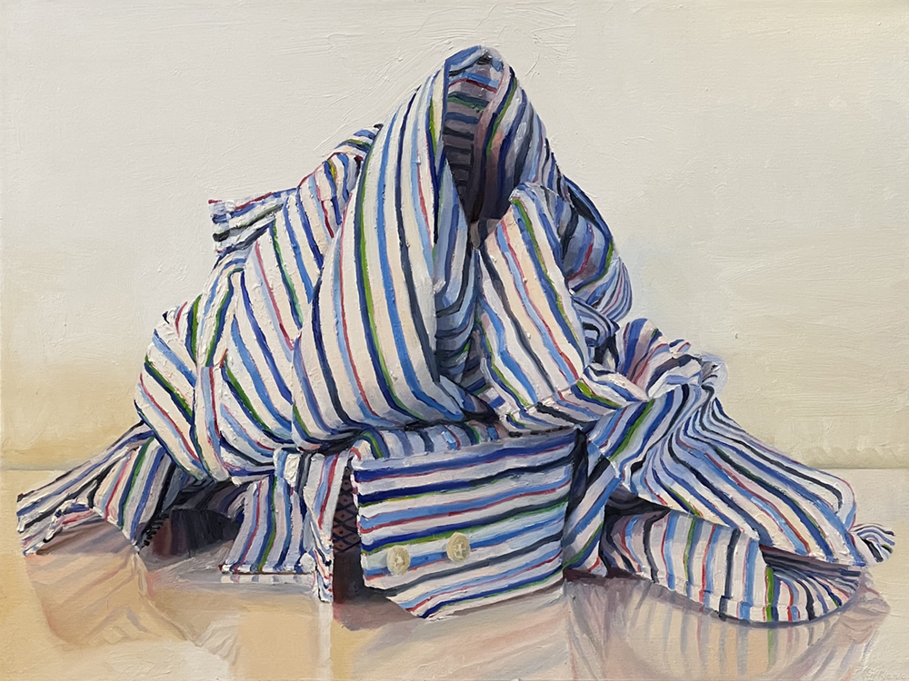 Oil painting of a striped shirt in a bundle on the floor
