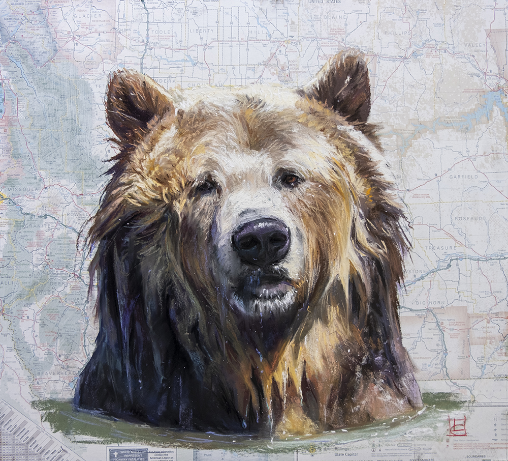 Pastel painting of a bear's head coming out of the water, painted on a Montana map