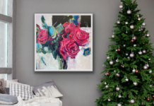 Featured Artwork: Beth Clary Schwier Living room scene with Christmas tree and painting of big pink roses