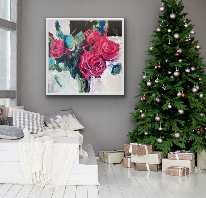Living room scene with Christmas tree and painting of big pink roses
