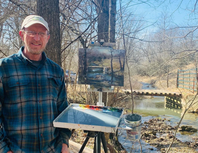 Artist Farley Lewis with his plein air painting