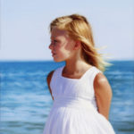 Featured Artwork: Nanette Fluhr oil portrait side painting of girl at the beach