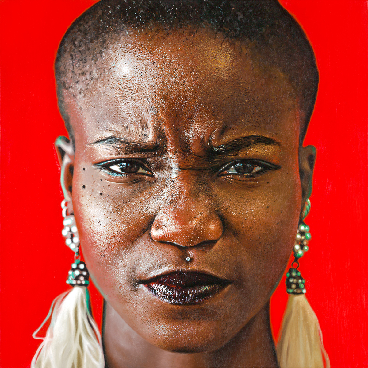 oil painting of a realistic face of a woman with her eyebrows narrowed, and eyes locked on the viewer. Wearing long flow-y earrings. Red background 