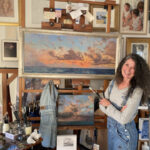 Artist Spotlight: Karen Ann Hitt artist with her current paintings in her studio