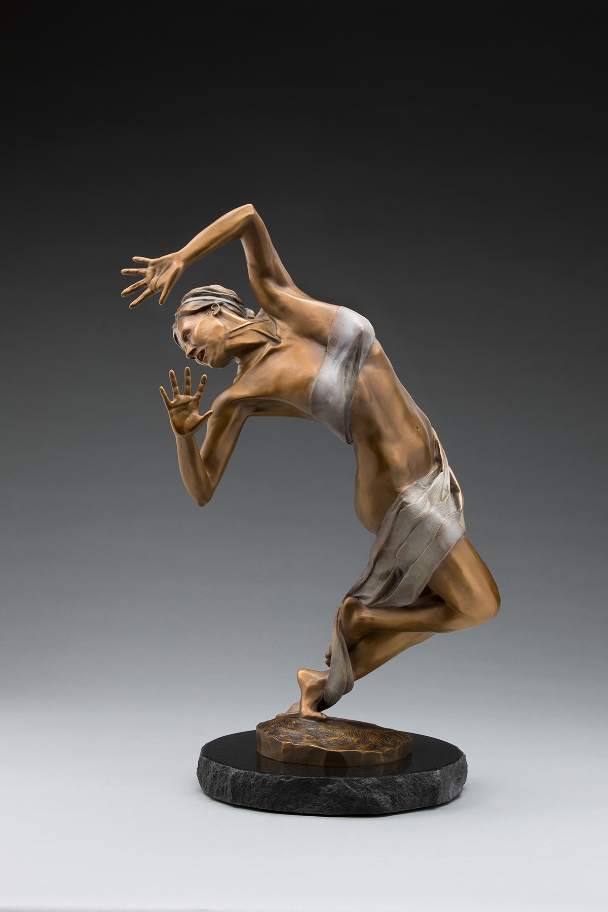 sculpture of a girl bending body backwards, standing on toes; arms bending behind