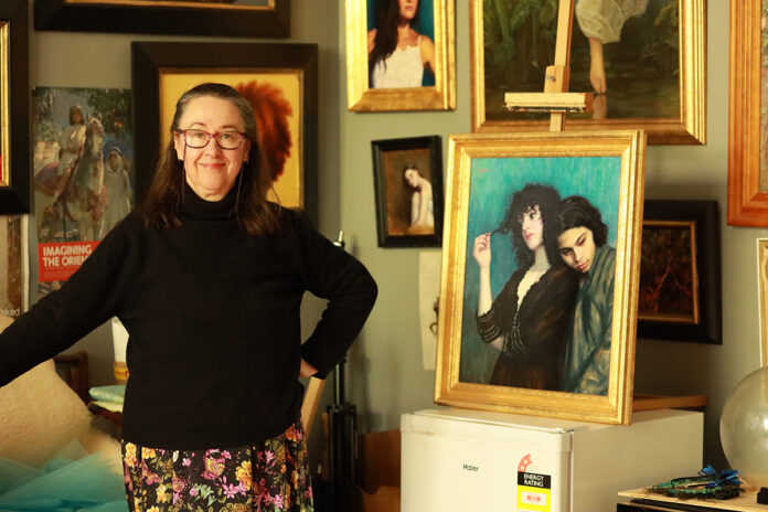 Vicki Sullivan in Her studio on the Mornington Peninsula, surrounded by her paintings