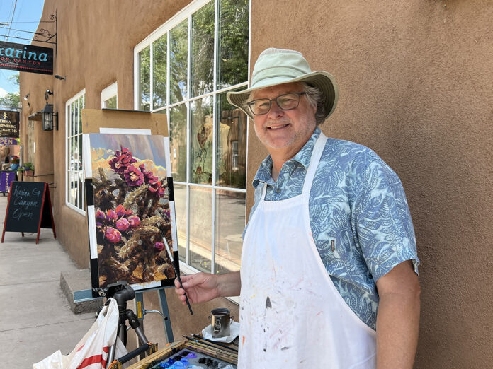 John painting on Canyon Road