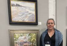 Artist Spotlight: Poppy Balser photo of artist with her paintings