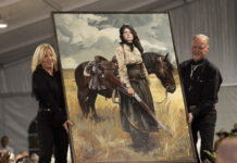 44th Annual Buffalo Bill Art Show & Sale Painting by Santiago Michalek on the runway during the 2024 Live Auction