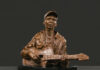 Sculptor Spotlight: Susan Wakeen and a Revelation of Character contemporary realism sculpture - Susan Wakeen, "The Guitar Player," 2020, bronze on marble base (edition of 12), 10 x 11 x 5 in., available through the artist