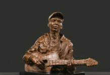 Sculptor Spotlight: Susan Wakeen and a Revelation of Character contemporary realism sculpture - Susan Wakeen, "The Guitar Player," 2020, bronze on marble base (edition of 12), 10 x 11 x 5 in., available through the artist