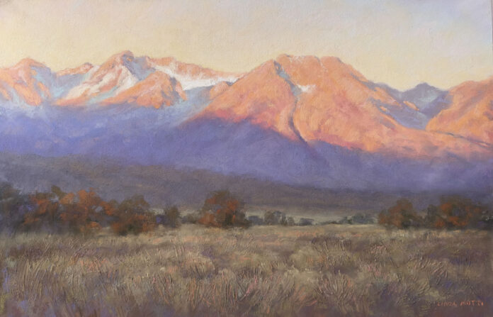 red mountains behind a shadow