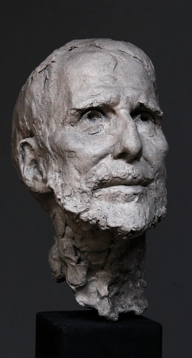 Representational sculpture of a man's face and head