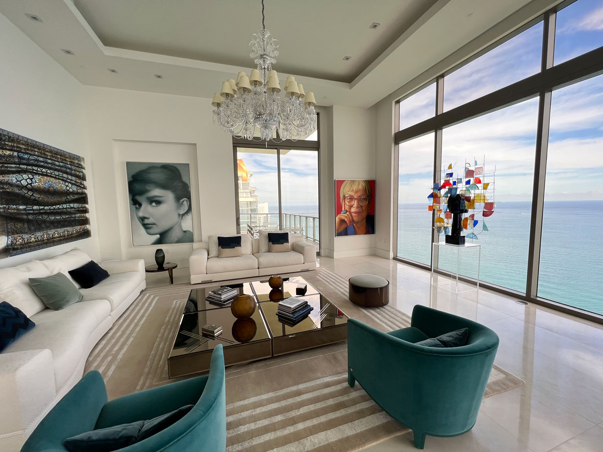 The completed portrait hanging (at far right) in the home of the collector who acquired it during Context Art Miami.