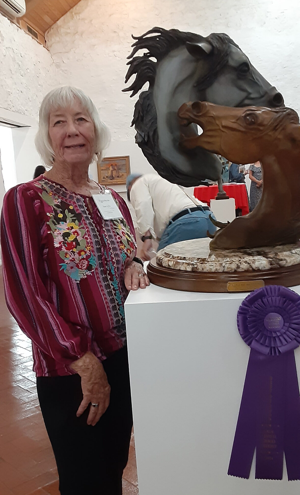 Bonnie Griffin earned Best of Show with her sculpture "Dance of Stallions."