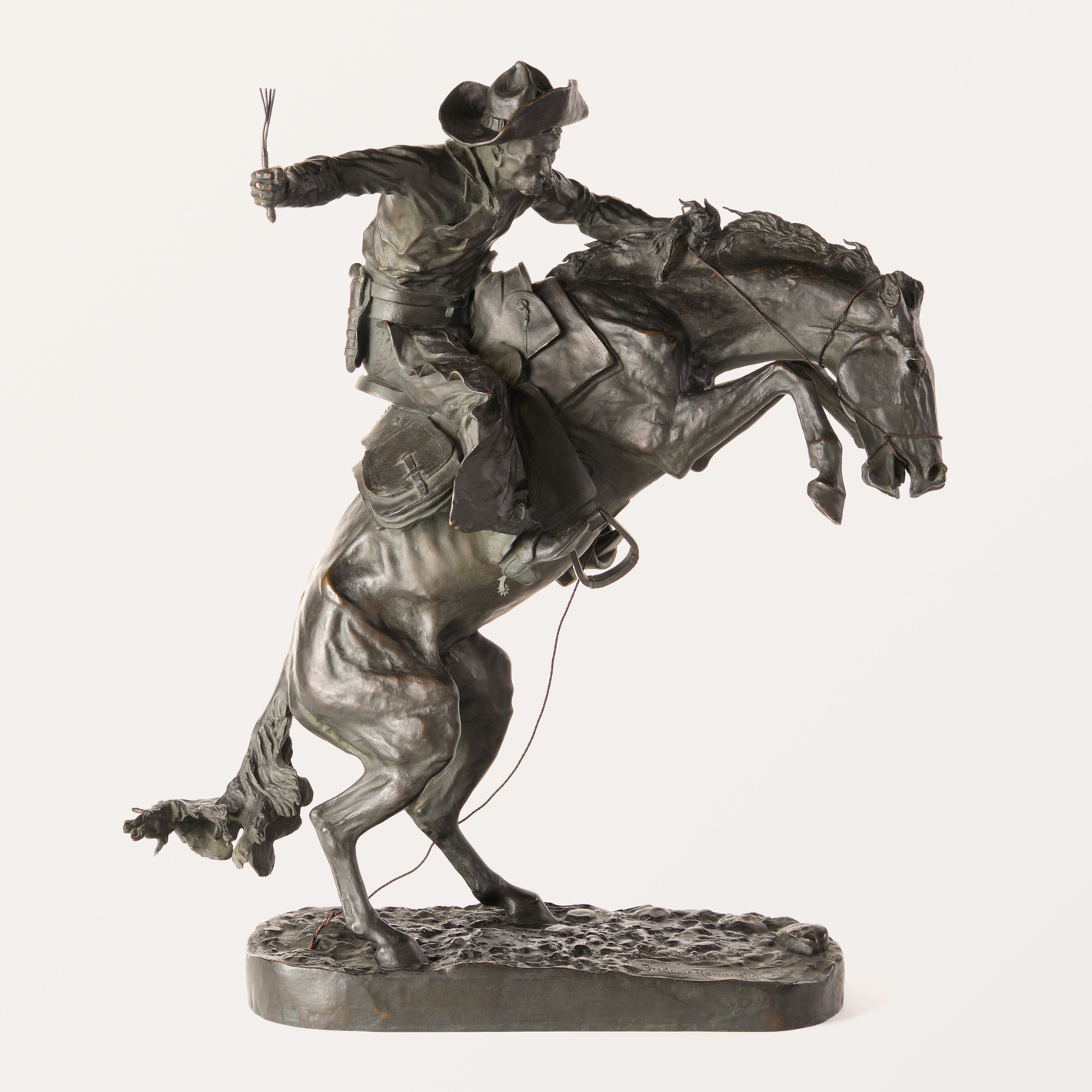 Frederic Remington (1861–1909), "The Broncho Buster," bronze, lifetime cast, no. 2, 23.75 × 20.25 × 12.25 inches